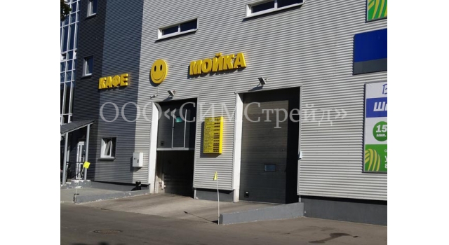 Промышленные секционные ворота купить в Минске по доступной цене от  СИМСтрейд
